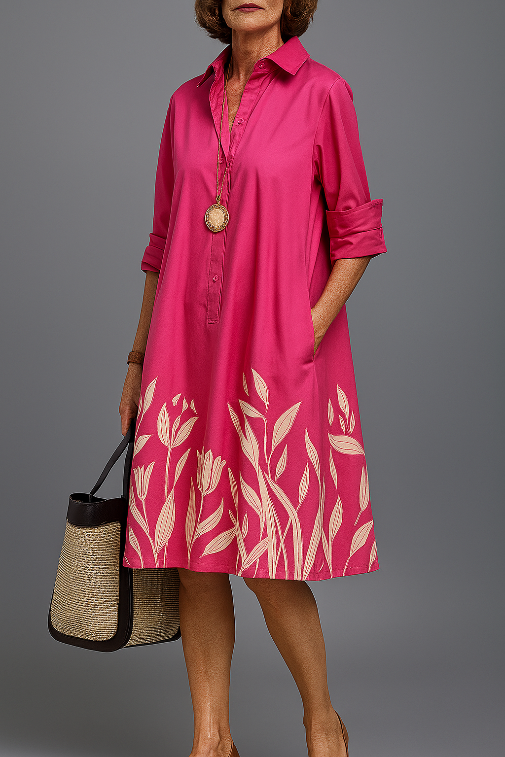 Robe midi élégante Danoir Paris Graciela en tissu rose, détail soigné et coupe sophistiquée, portée élégante.