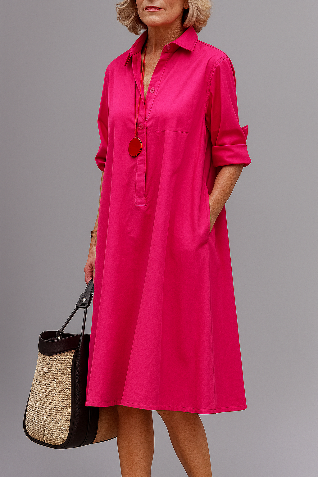 Robe midi élégante Danoir Paris Soléva en tissu rose, avec coupe soignée et détails raffinés pour un look chic.