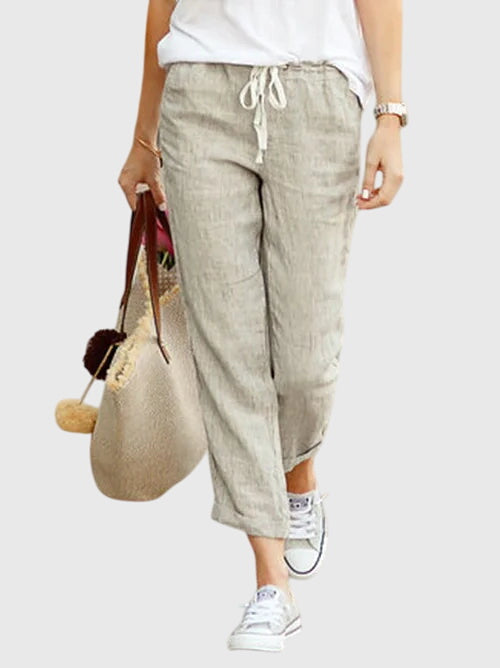 Pantalons d'été élégants Zanra™ de Danoir Paris en coloris abricot, tissu léger et style sophistiqué pour homme.