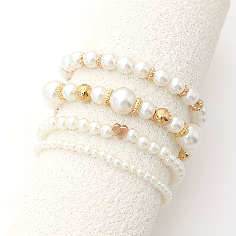 Ensemble de 4 bracelets empilables en perles de la collection Danoir Paris, bijoux élégants pour femme.
