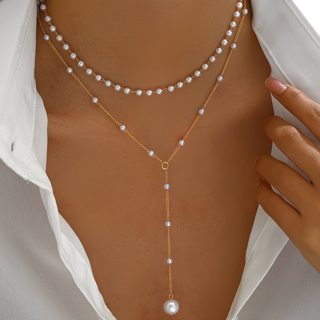Collier de perles graduées de la collection All Jewelry de Danoir Paris, élégant et sophistiqué, visible en gros plan.