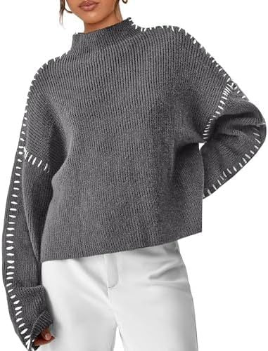 Pull confortable Danoir Paris Nia pour l'automne, en tissu doux et chaud, de couleur noire, porté sur un mannequin.