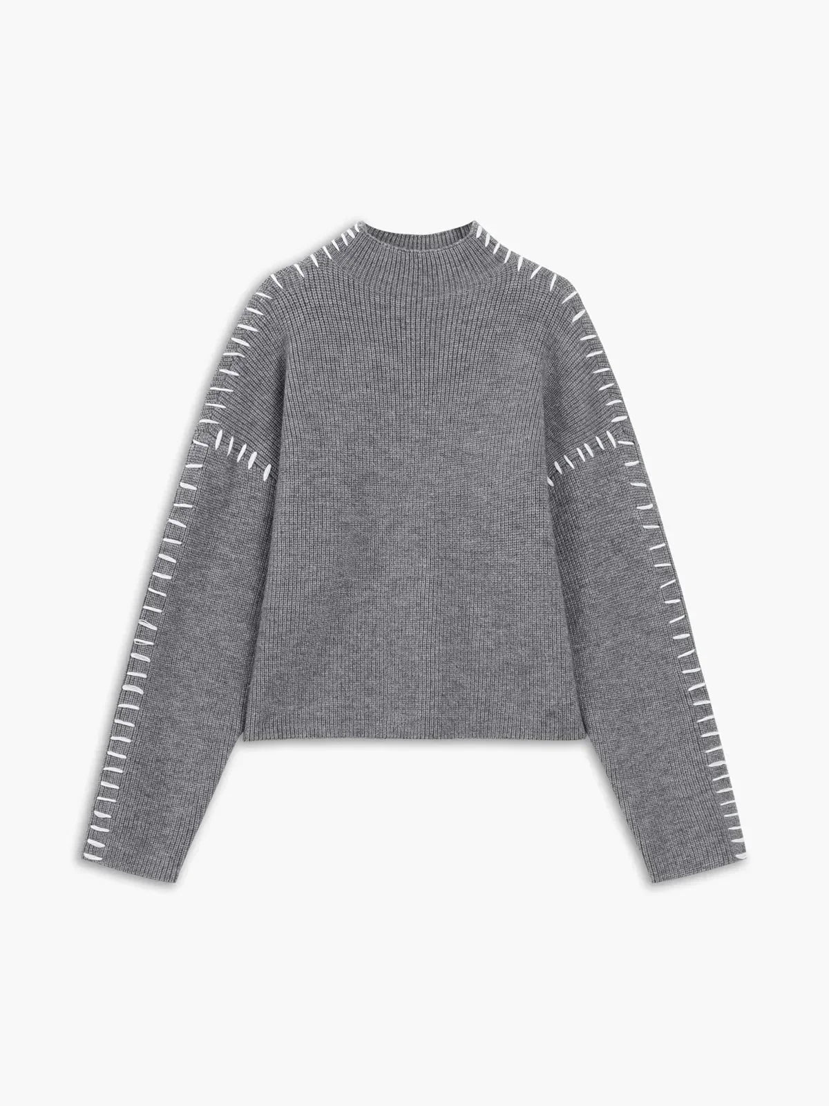 Pull confortable Danoir Paris Nia pour l'automne, en tissu doux et chaud, couleur noire, porté sur un mannequin.