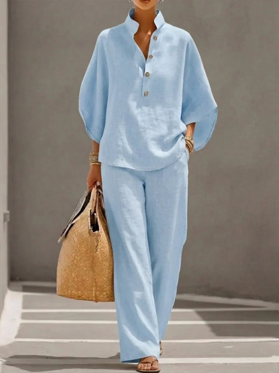 Ensemble en lin Danoir Paris Maribel avec manches murciélago et pantalon large, couleur bleu marine, pour un style chic et décontracté.