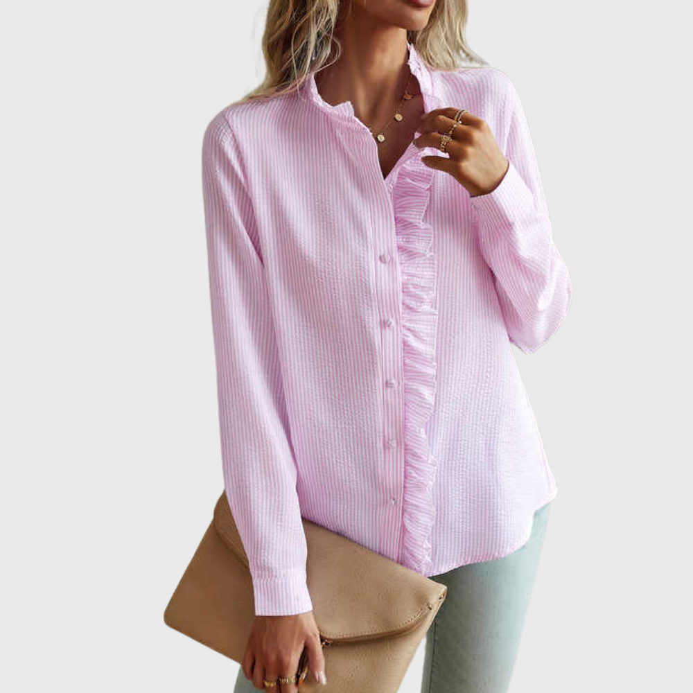 Blouse élégante Agnete de Danoir Paris en tissu bleu, vue détaillée du haut avec col et manches longues.