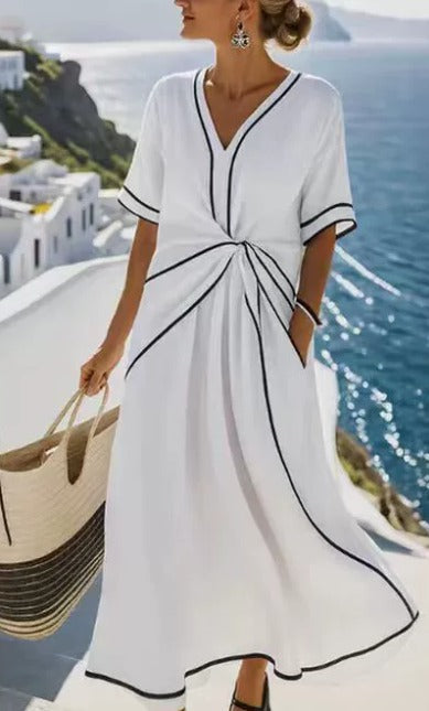 Robe décontractée Clara de Danoir Paris en tissu bleu, vue de face avec détails de coupe confortable.
