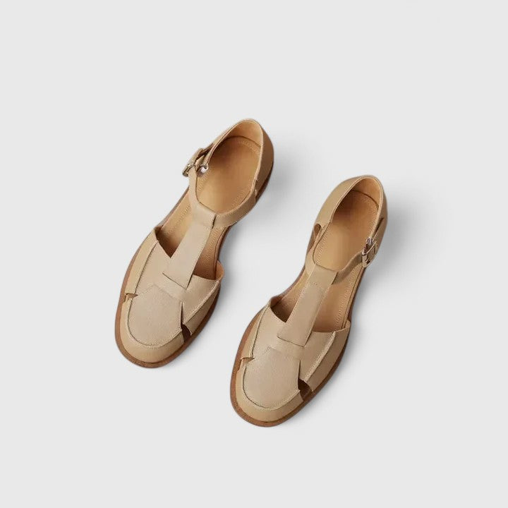 Faustine™ Danoir Paris bébés découpes latérales, vêtement beige pour bébés, détails de couture visibles.