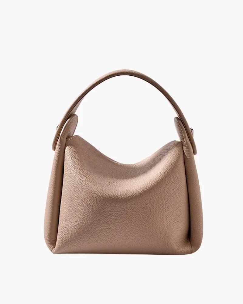Sac à main beige Classy Lady de Danoir Paris avec poignée élégante et détails sophistiqués.