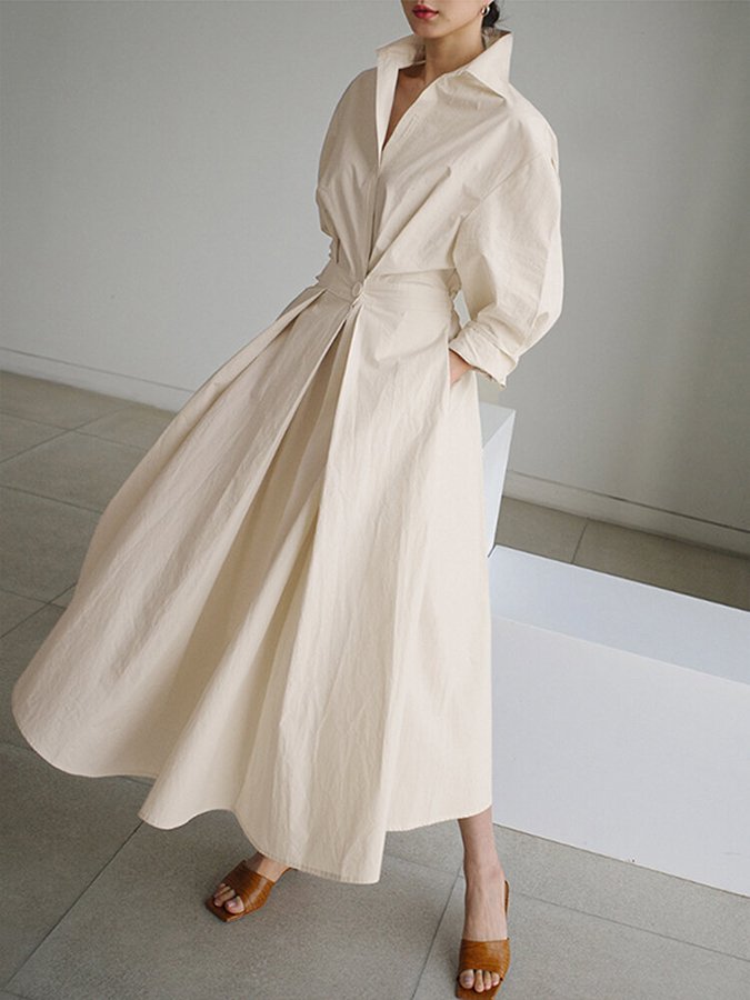 Robe longue élégante beige Clémence par Danoir Paris, vue de face avec détails sophistiqués et tissu fluide.