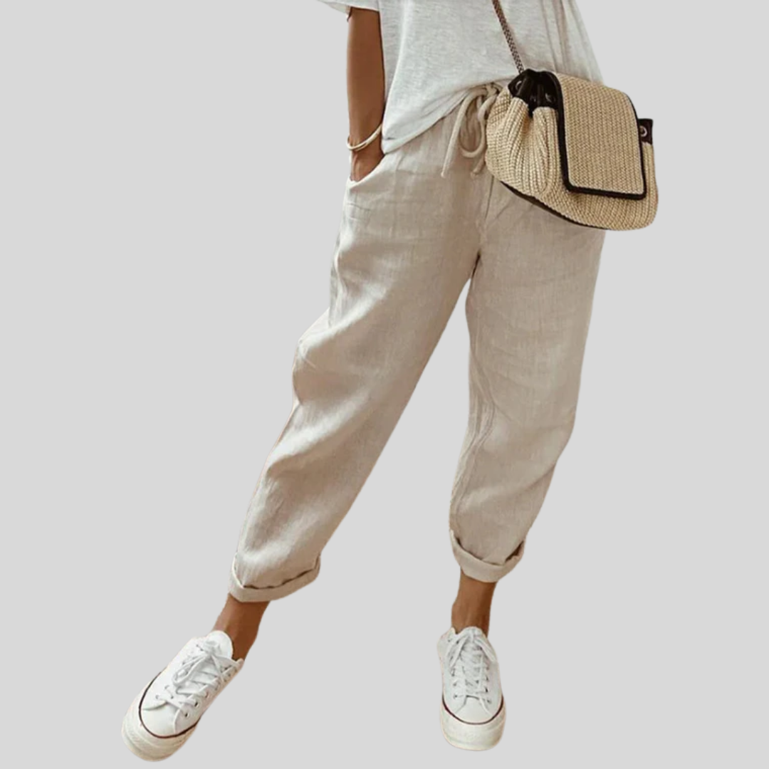Pantalons fluides et élégants Danoir Paris beige, confortables pour un style sophistiqué et décontracté.
