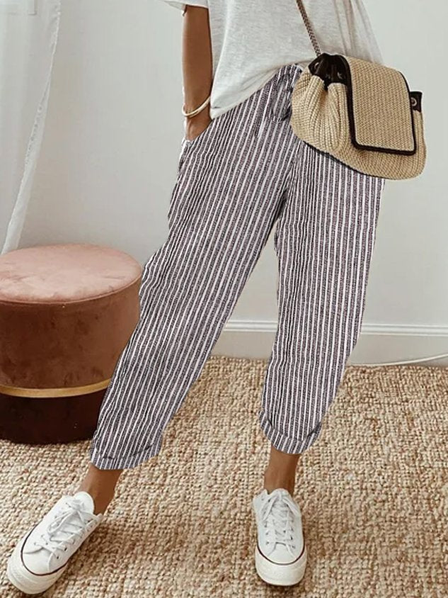 Pantalons fluides beige Danoir Paris, confortables et élégants, visibles sur fond neutre.