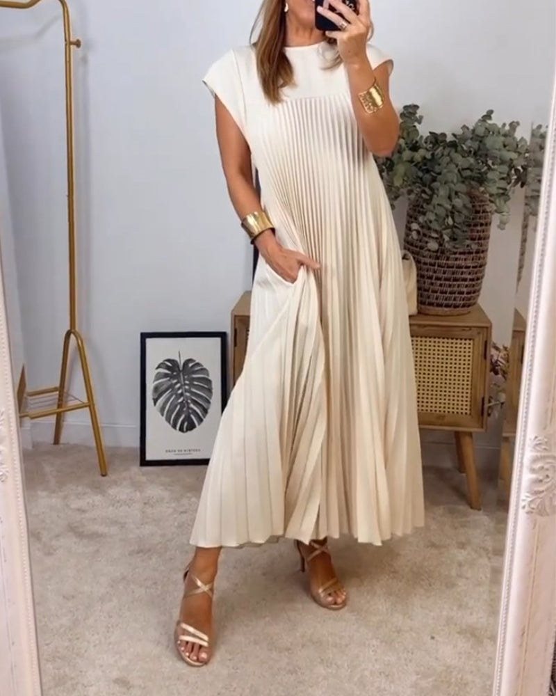 Robe longue élégante Sylvie de Danoir Paris en tissu beige, vue de face avec détails sophistiqués.