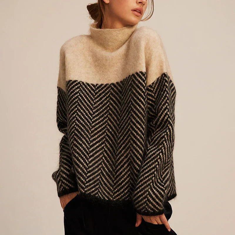 Pull torsadé beige Danoir Paris Mira, élégante et confortable, en laine douce, porté en vue de face sur mannequin.