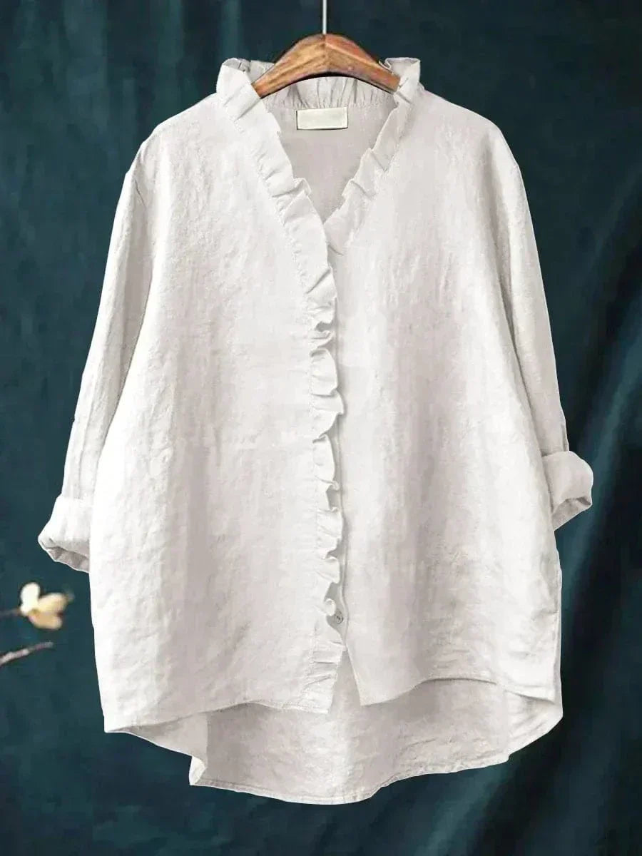 Blouse d'été élégante Eline en lin blanc de Danoir Paris, style léger et sophistiqué pour femmes.