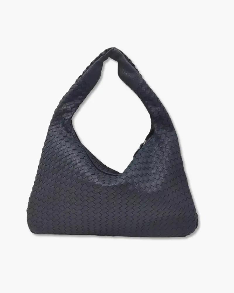 Sac à main noir Danoir Paris The London, en cuir avec poignées élégantes et détails sophistiqués, vue de face.