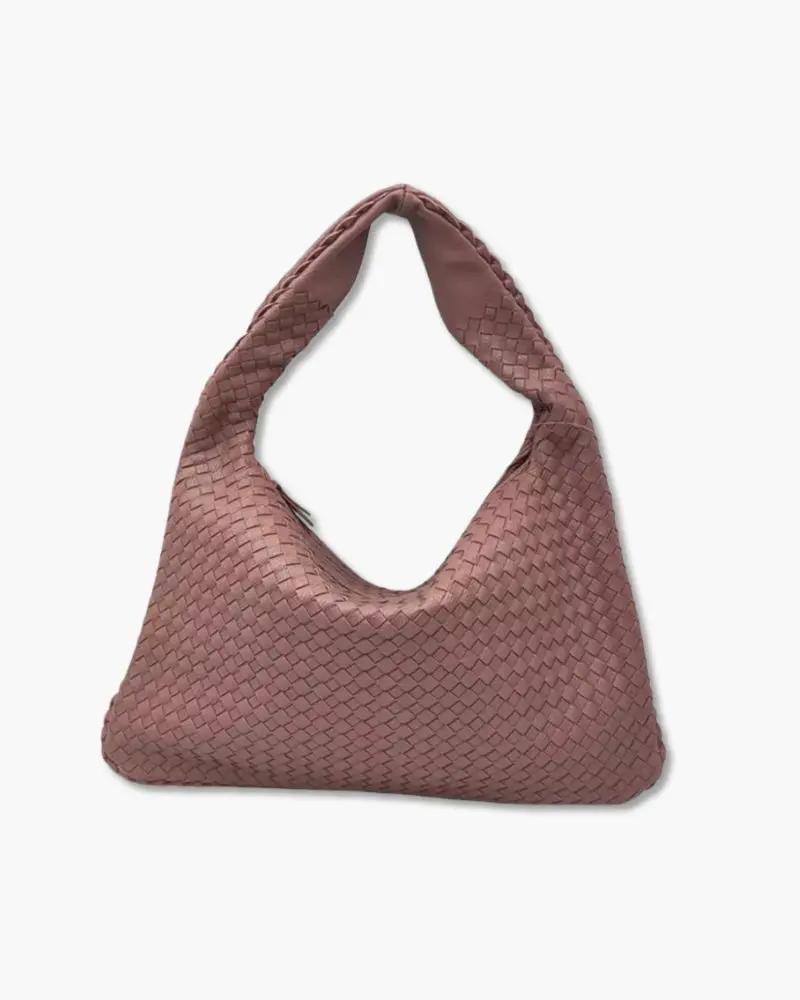 Sac à main The London de Danoir Paris en cuir noir, avec poignée élégante et détails modernes.