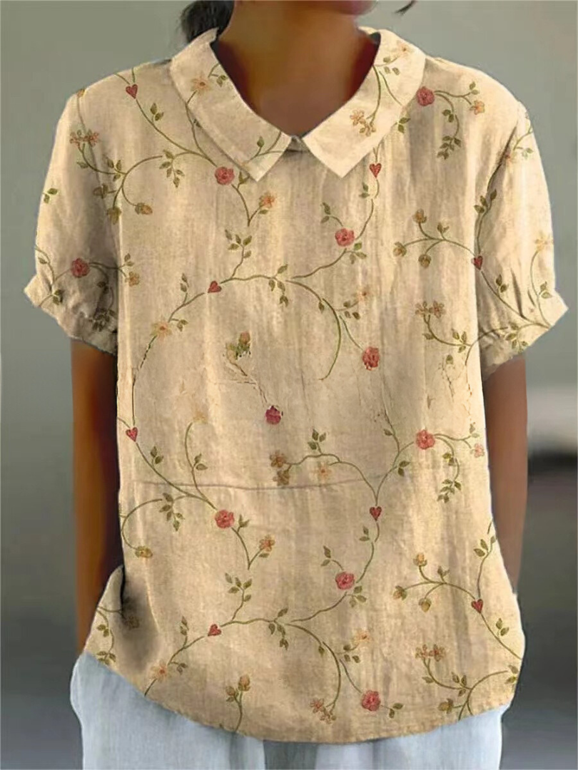 Chemise fleurie élégante Sofia de Danoir Paris, tissu blanc avec motif floral, vue de face.