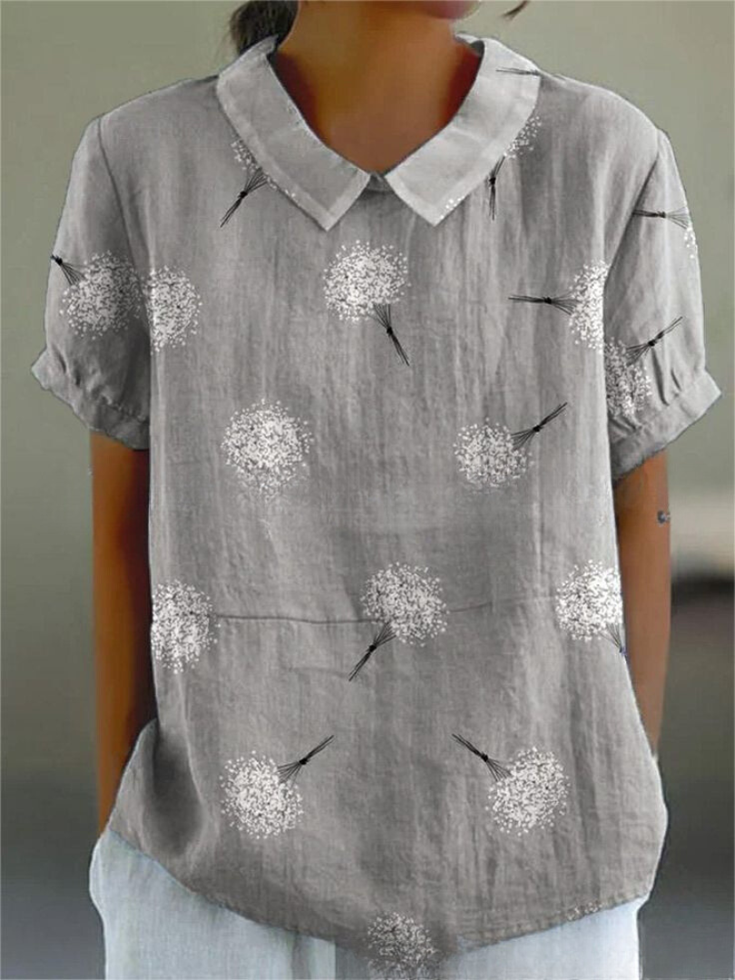 Chemise fleurie élégante Sofia de Danoir Paris, tissu blanc avec motif floral, vue de face sur mannequin.