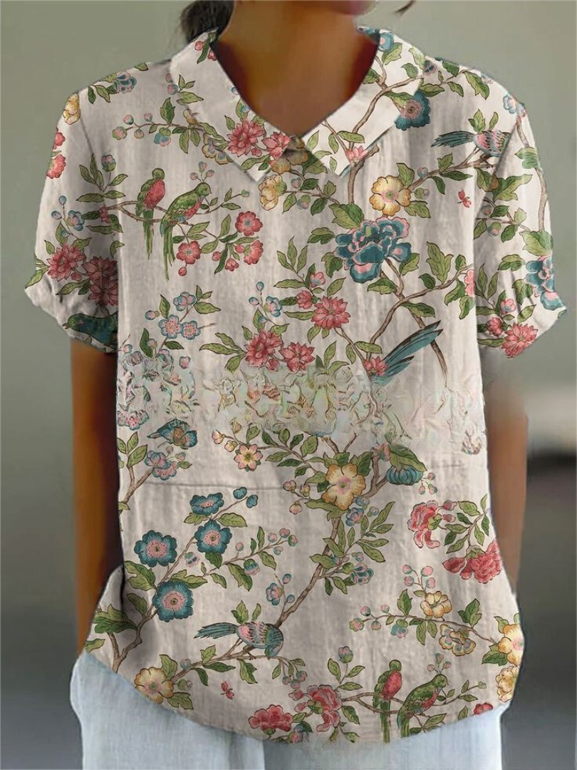 Chemise fleurie élégante Sofia de Danoir Paris, tissu blanc à motifs floraux, vue de face.