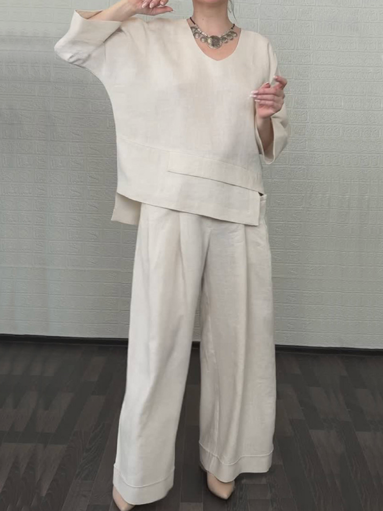 Ensemble décontracté en coton-lin blanc cassé de la marque Danoir Paris, veste et pantalon confortables pour un style casual.