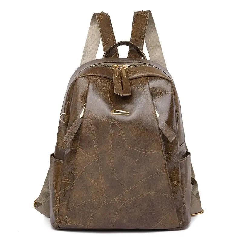 Sac à dos blanc Danoir Paris Lydia, sac à dos chic classique en cuir avec bandoulière et poches élégantes.