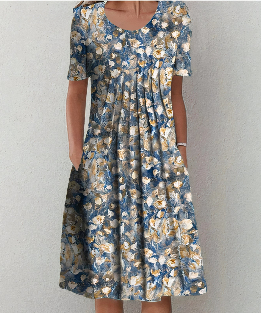 Robe florale élégante Danoir Paris pour femme, motif blanc et rouge, détails sophistiqués, vue de face