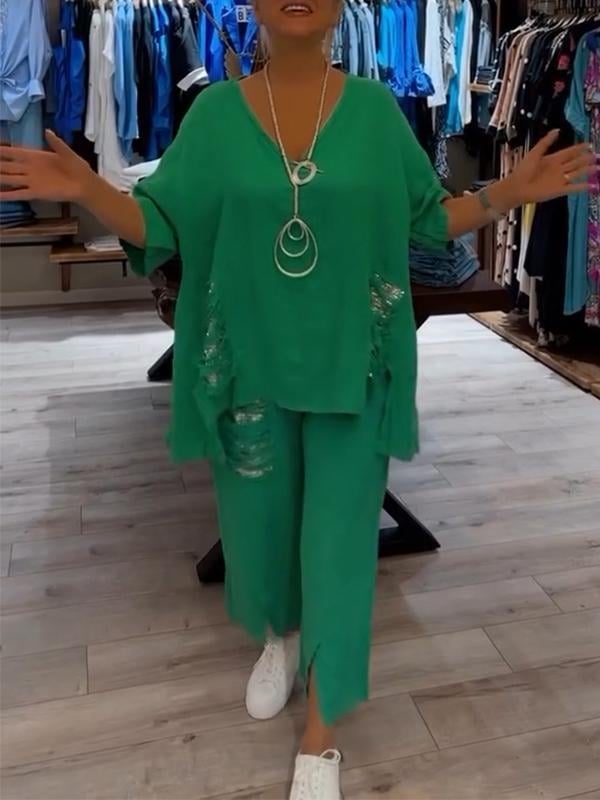 Ensemble deux pièces Bianca pour l'été de Danoir Paris, haut blanc avec détails légers et pantalon assorti, vue de face.