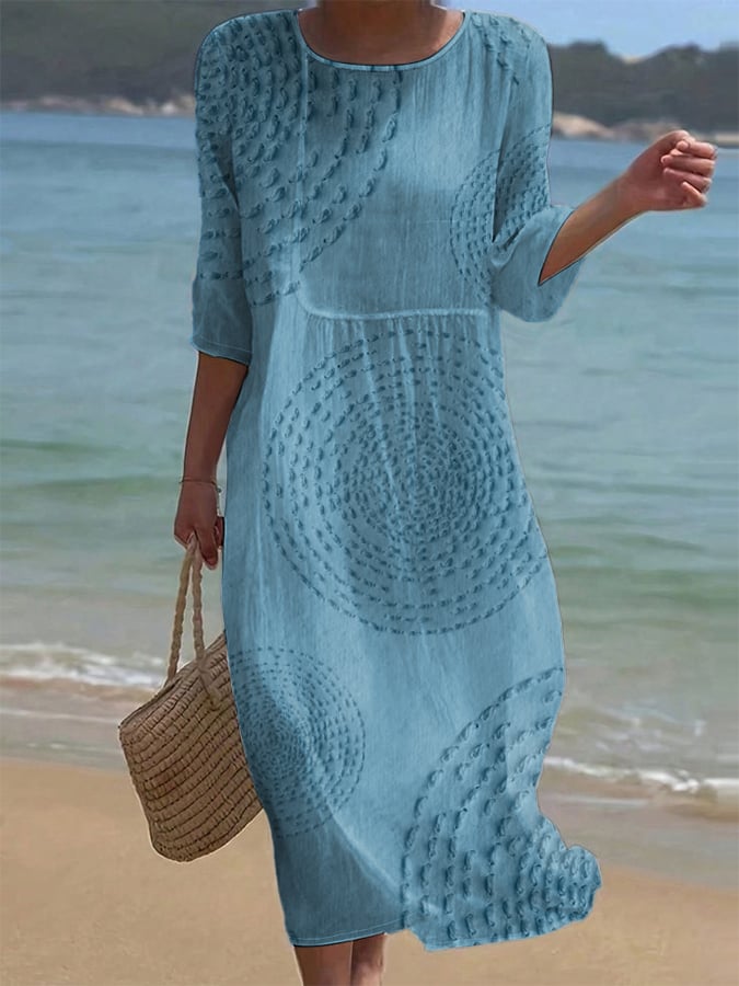 Robe midi élégante Améliane™ de Danoir Paris avec détails délicats, en tissu blanc, vue de face sur mannequin.