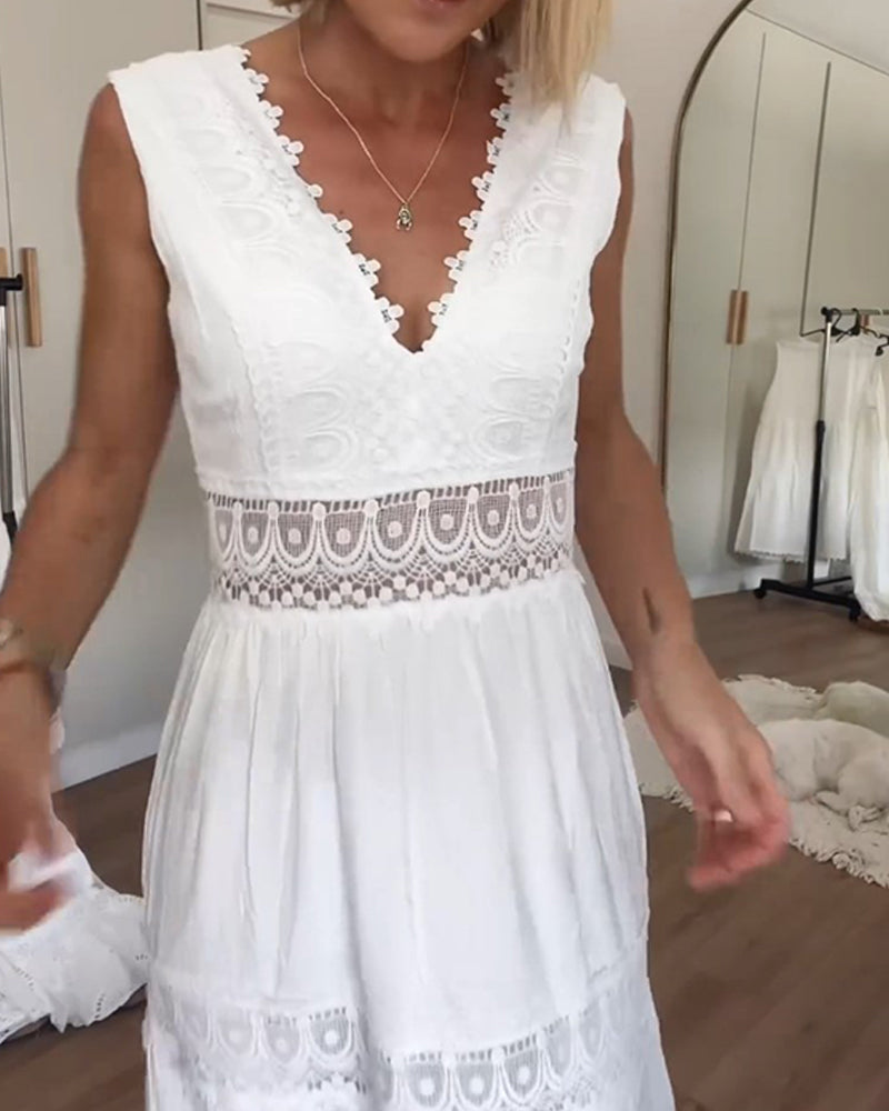 Robe élégante d'été Charlotte de Danoir Paris en tissu blanc avec détails raffinés, vue de face.