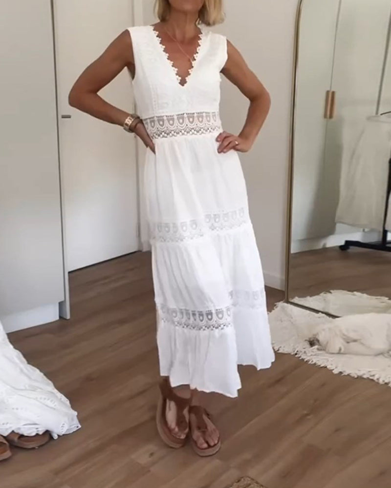 Robe élégante d'été Charlotte de Danoir Paris en tissu blanc, avec coupe fluide et détails raffinés.