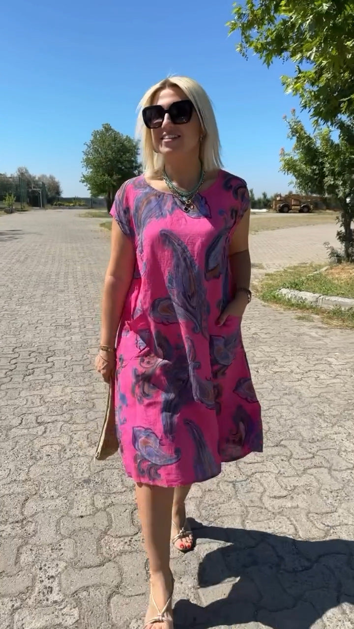 Robe estivale élégante Charlotte de Danoir Paris en blanc, vue de face avec détails légers et tissu fluide.
