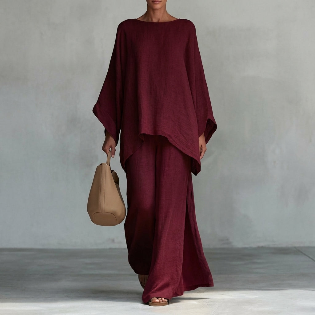 Ensemble deux pièces Danoir Paris Christine avec manches longues et pantalon large en tissu blanc.