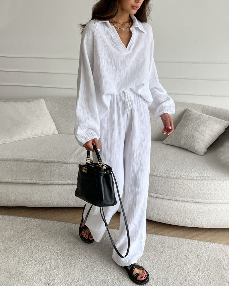 Ensemble élégant et confortable Felicità de Danoir Paris, en tissu blanc avec détails sophistiqués.