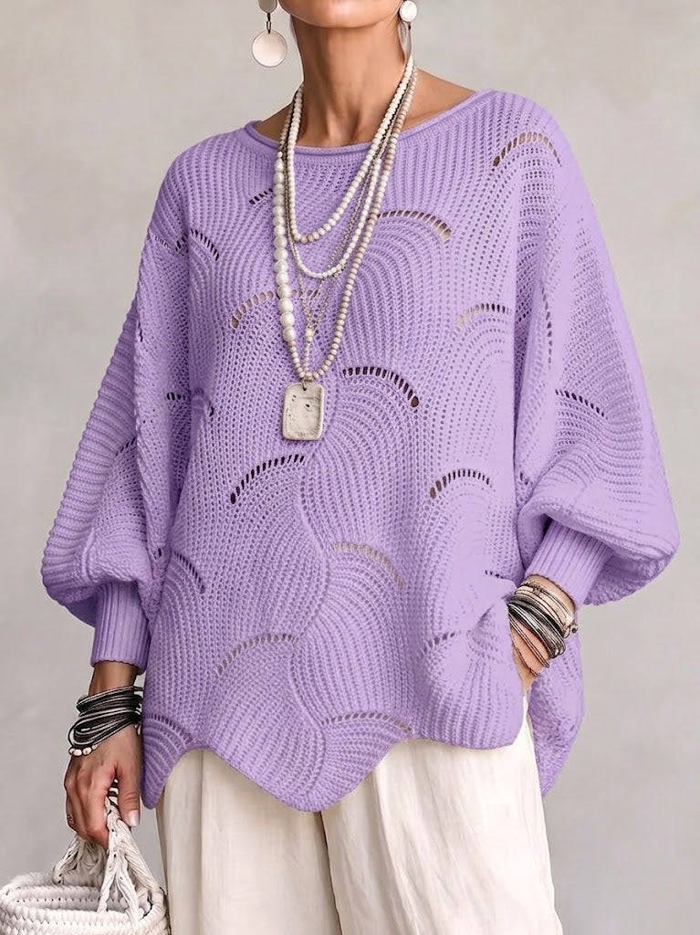 Haut en tricot blanc Danoir Paris à manches lanternes amples avec motif en vagues creuses, vue de face.