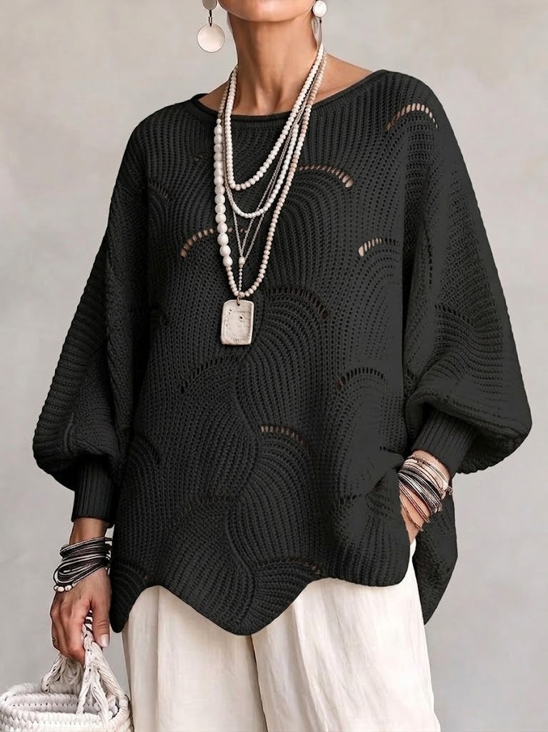 Haut en tricot blanc Danoir Paris à manches lanternes amples avec motif en vagues creuses, vue de face.