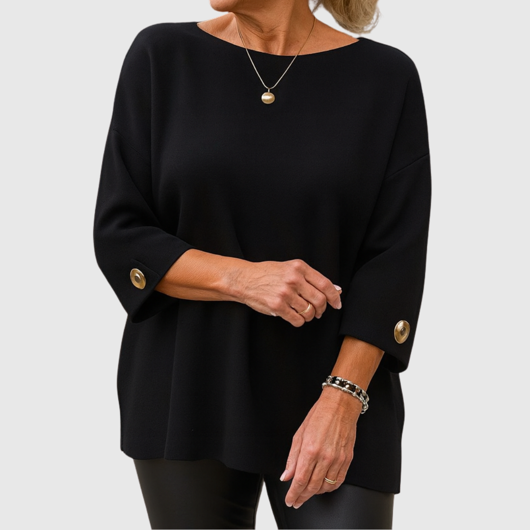Pull Julianette élégant blanc de Danoir Paris, en laine douce, porté sur un mannequin, style sophistiqué et moderne.