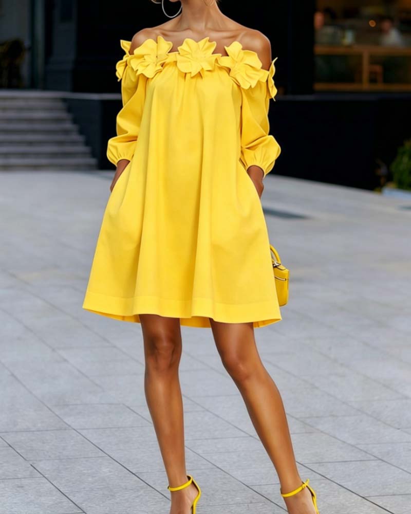 Robe à bretelles dénudées Rhoda de Danoir Paris avec appliqué floral blanc, vue de face sur fond neutre.