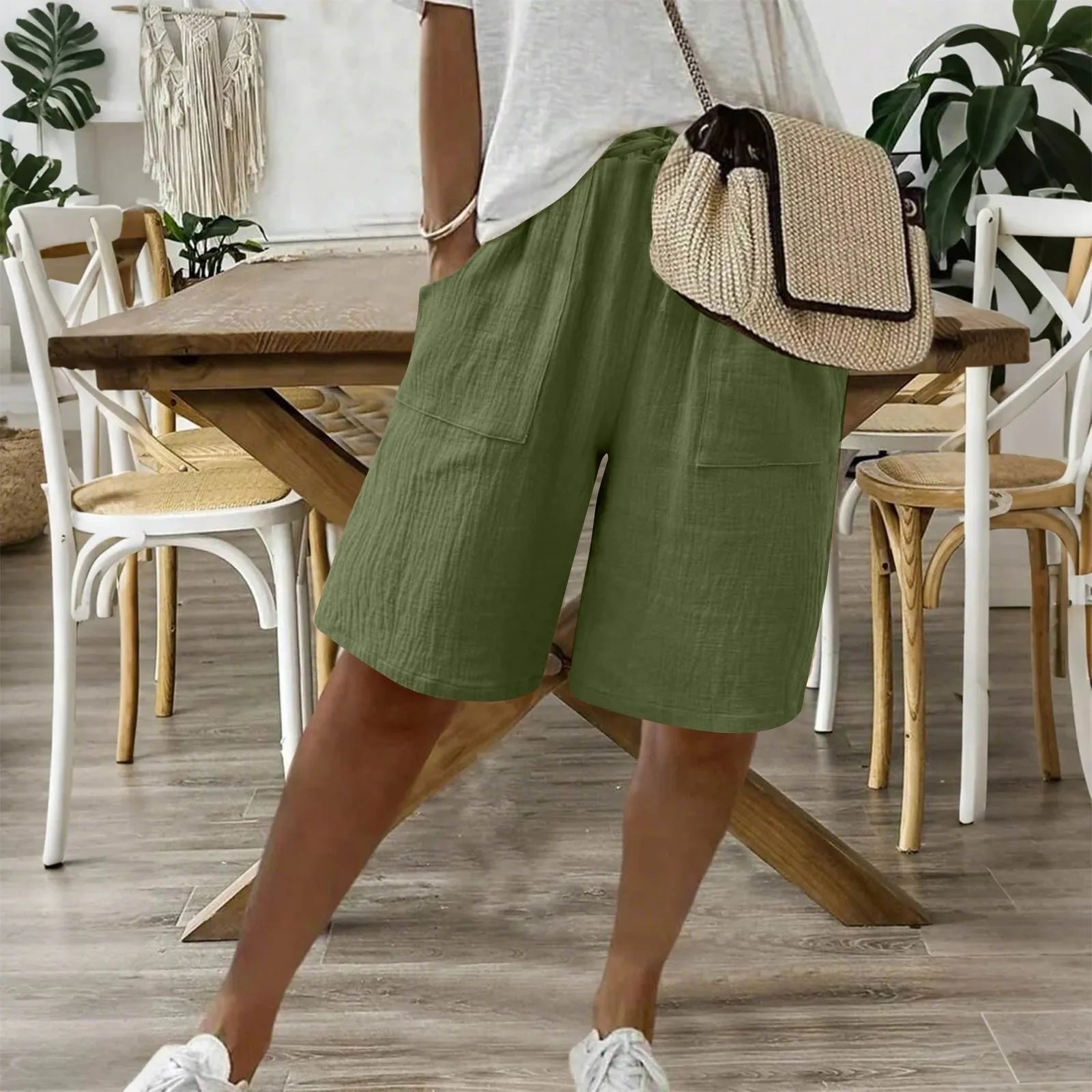 Shorts en coton lin Sienna de Danoir Paris, blanc, avec coupe décontractée et poche latérale visible.