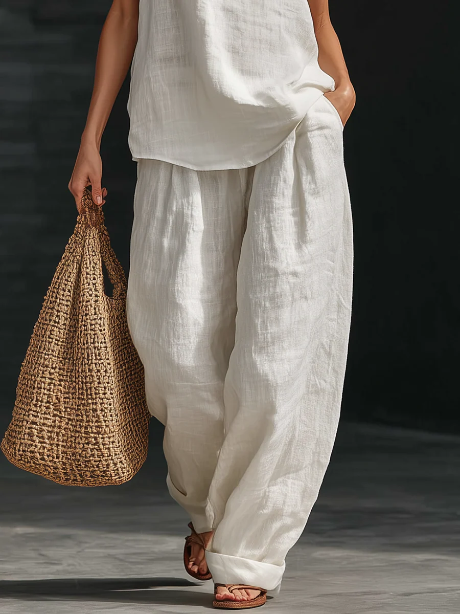 Ensemble sans manches et pantalon large Zoë™ de Danoir Paris, vêtement blanc élégant pour femme.