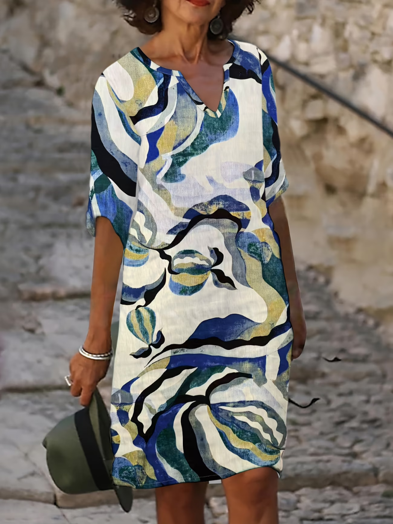 Robe d'été légère Danoir Paris Emma en tissu bleu, style fluide et confortable pour l'été.