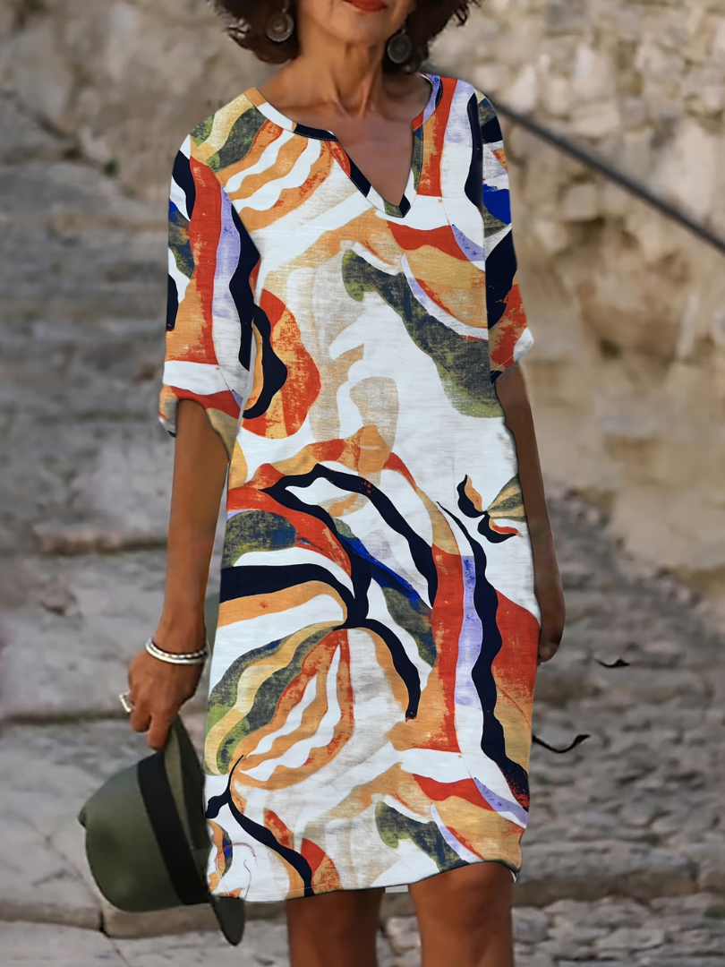 Robe d'été légère Danoir Paris Emma en tissu bleu, style fluide et confortable pour la saison estivale.