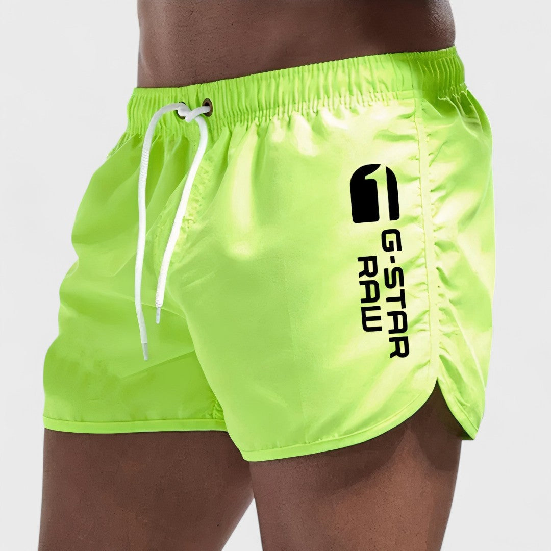 Maillot de bain court pour homme Laluna® Danoir Paris en bleu, vue de face, en tissu léger pour plage et piscine.