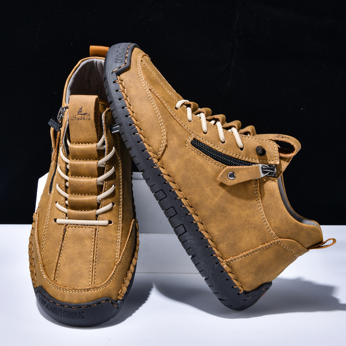 Chaussures en nabuk bleu Danoir Paris pour homme avec zip, semelle en cuir et design élégant.