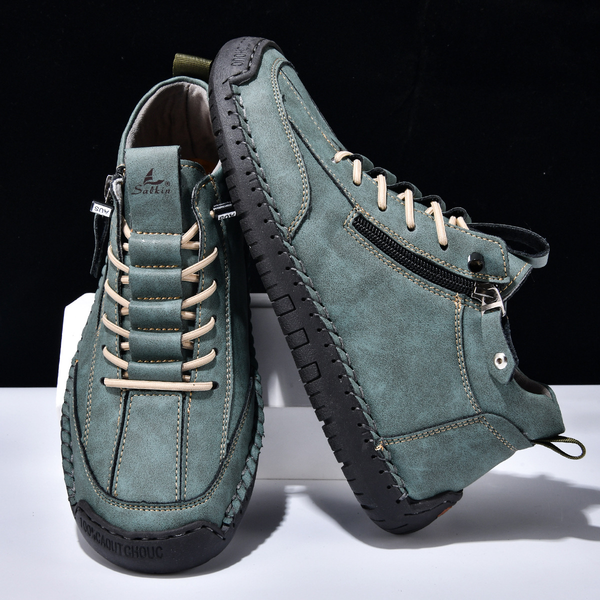 Chaussures en nabuk bleu Danoir Paris pour homme avec zip, semelle en cuir et design élégant.