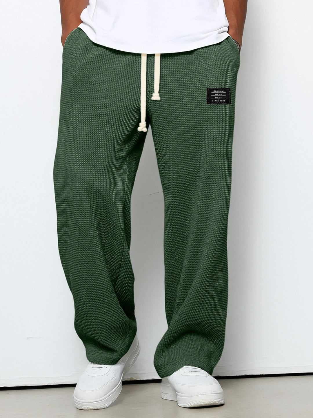 Pantalon large Danoir Pairs™ en tissu bleu ciel avec taille ajustable, pour un style confortable et décontracté.