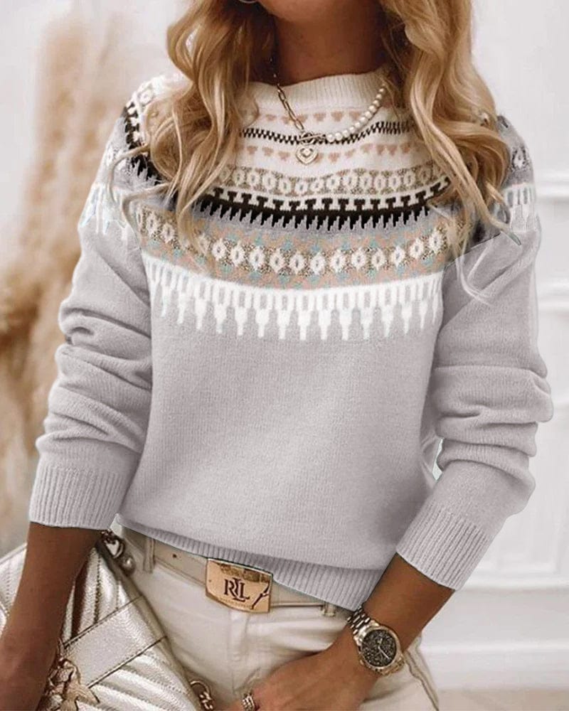 Pull douillet chic Sophia de Danoir Paris en bleu clair, détail du tissu doux et élégant pour un style confortable et sophistiqué.