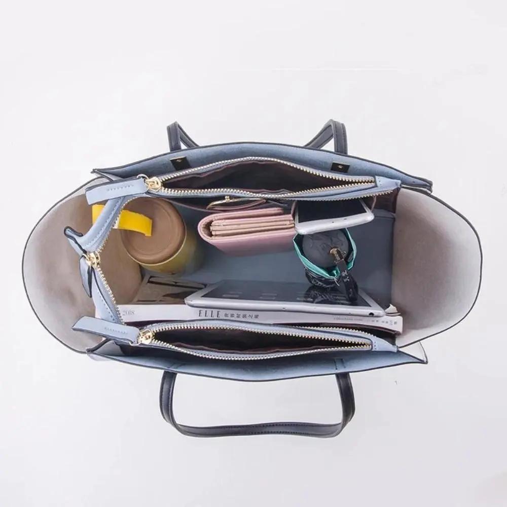 Ensemble de 4 sacs de shopping élégants et luxueux Danoir Paris, sacs en tissu bleu avec poignées robustes.