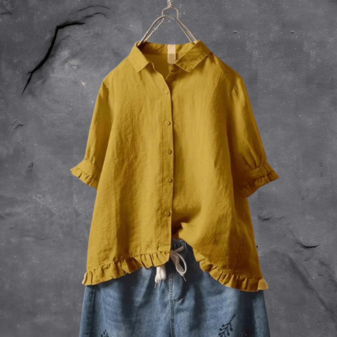 Chemise élégante Danoir Paris Carey en bleu marine, tissu polyvalent et moderne, portée sur mannequin.
