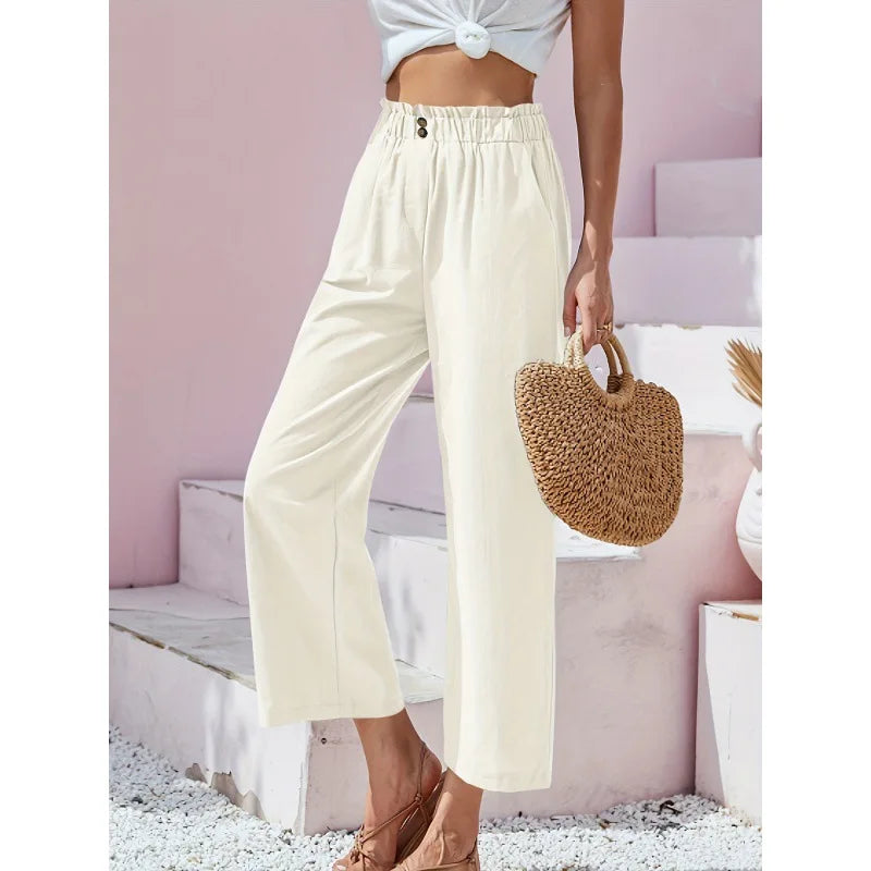 Pantalon d'été en lin-coton Soléa de Danoir Paris, coloris bleu marine, coupe décontractée, porté sur un mannequin blanc