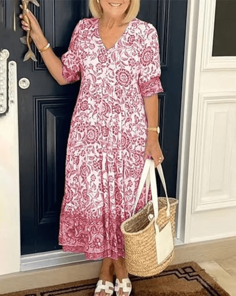 Robe d'été élégante Danoir Paris Manelle en tissu bleu, manches courtes et coupe fluide pour un style chic et confortable.